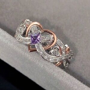 Elegant Silver and Rose Gold Ring with Purple Gemstone